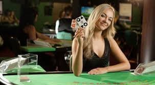 Filipino player browsing 202pub Games lobby on a smartphone showing slots and live casino